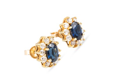 Lot 54 - A PAIR OF SAPPHIRE AND DIAMOND CLUSTER...