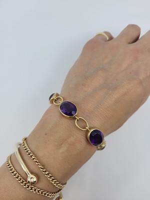 Lot 99 - A VINTAGE IRISH AMETHYST BRACELET, in 18ct...