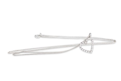 Lot 38 - A DIAMOND HEART SHAPED PENDANT, mounted in...