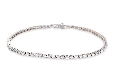 Lot 45 - A DIAMOND LINE BRACELET, the brilliant cut...