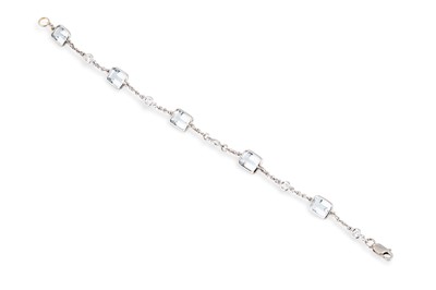 Lot 47 - AN AQUAMARINE AND DIAMOND BRACELET, mounted in...
