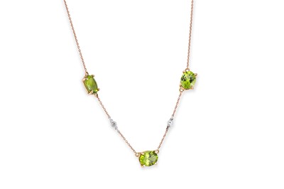 Lot 48 - A PERIDOT AND DIAMOND NECKLACE, set with three...