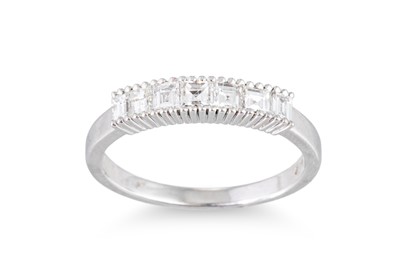 Lot 121 - A DIAMOND HALF ETERNITY RING, the ascher cut...