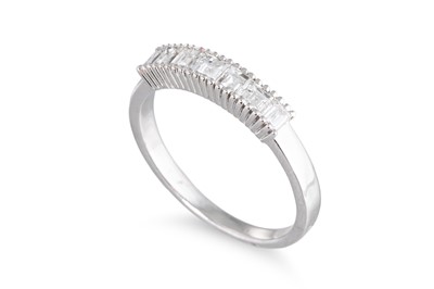 Lot 121 - A DIAMOND HALF ETERNITY RING, the ascher cut...