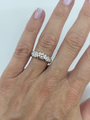 Lot 123 - A VINTAGE FIVE STONE DIAMOND RING, the...
