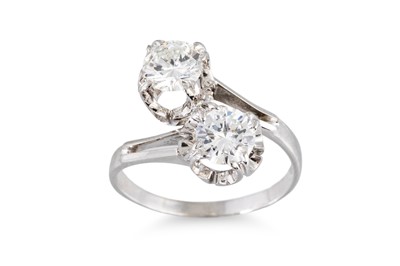 Lot 124 - A DIAMOND 'TOI ET MOI' CROSS-OVER RING, the...