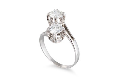 Lot 124 - A DIAMOND 'TOI ET MOI' CROSS-OVER RING, the...