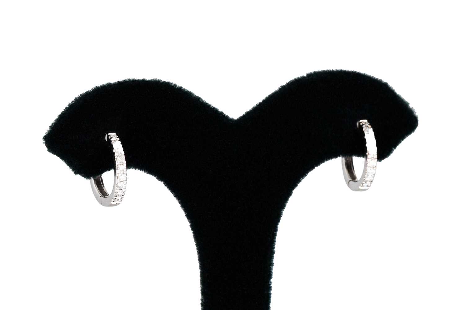 Lot 126 - A PAIR OF DIAMOND HOOP EARRINGS, huggie style,...