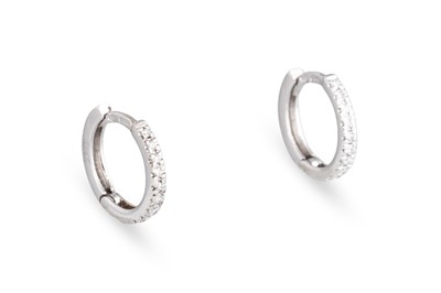 Lot 126 - A PAIR OF DIAMOND HOOP EARRINGS, huggie style,...