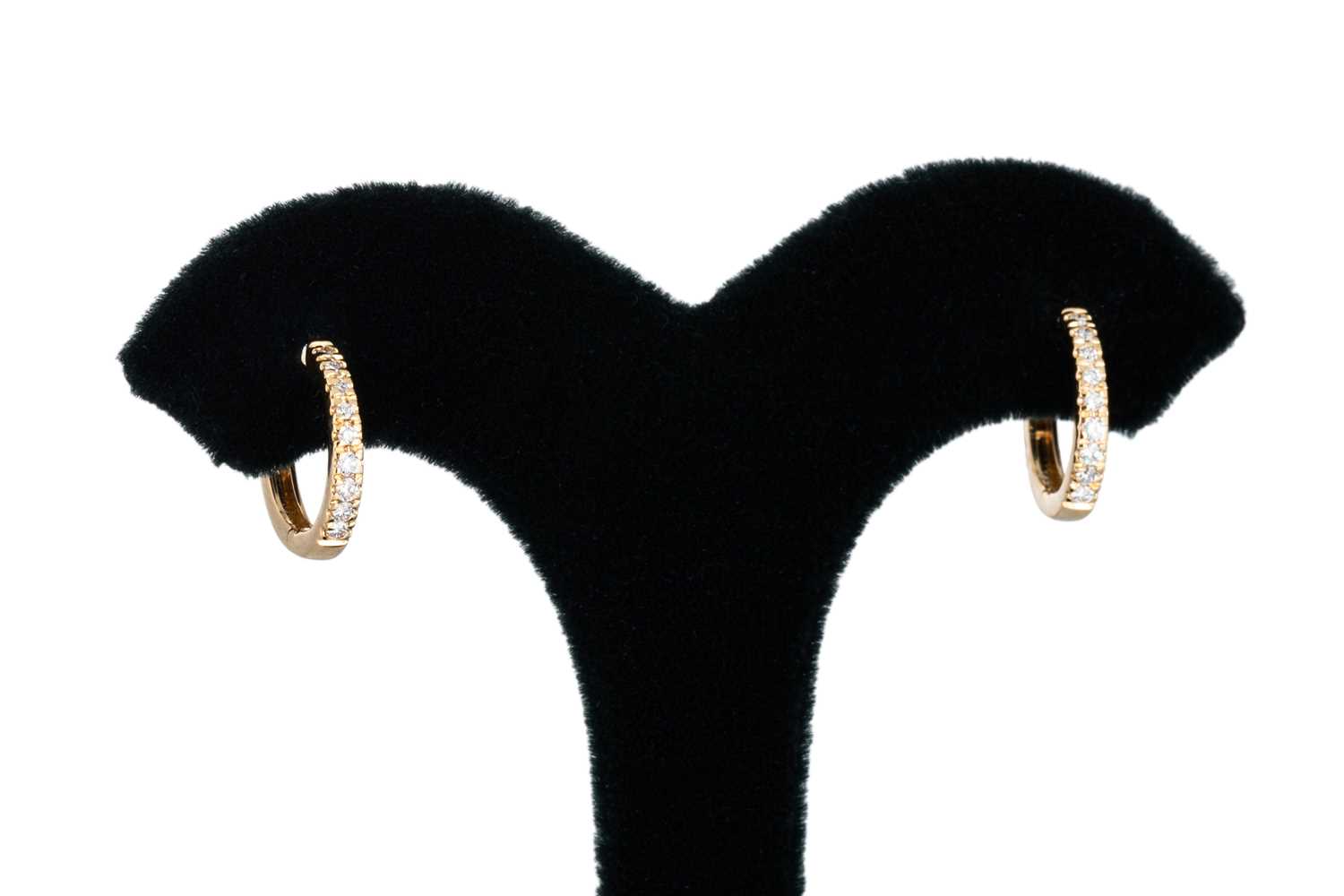 Lot 152 - A PAIR OF DIAMOND HOOP EARRINGS, huggie style,...
