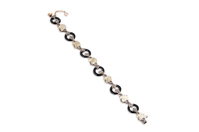 Lot 158 - A QUARTZ, DIAMOND, ONYX AND RUBY BRACELET,...