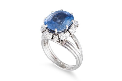 Lot 169 - A SAPPHIRE AND DIAMOND CLUSTER RING, mounted...