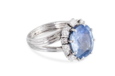 Lot 169 - A SAPPHIRE AND DIAMOND CLUSTER RING, mounted...