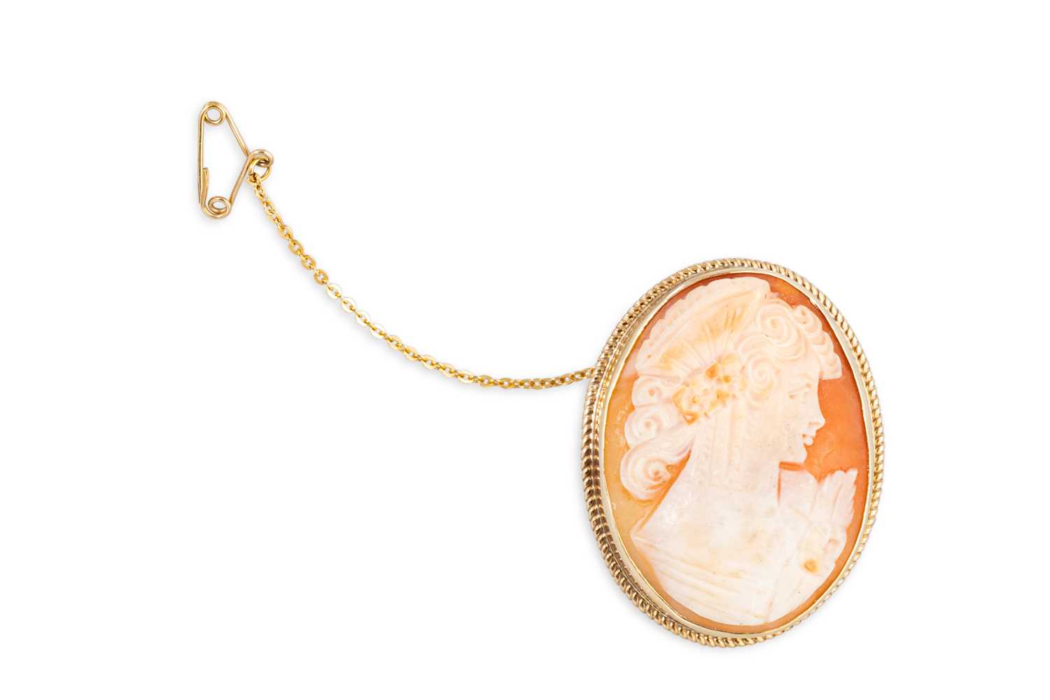 Lot 145 - A CAMEO BROOCH, mounted in a 9ct yellow gold...