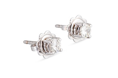 Lot 65 - A PAIR OF DIAMOND STUD EARRINGS, the brilliant...