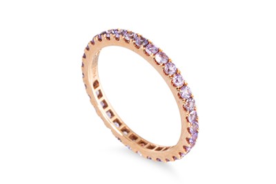 Lot 68 - A PURPLE SAPPHIRE FULL BANDED ETERNITY RING,...