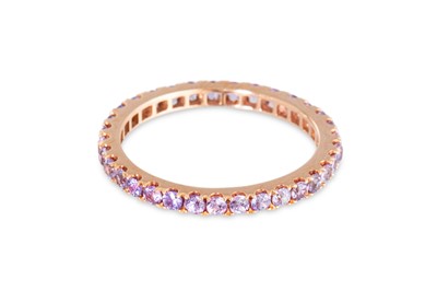 Lot 68 - A PURPLE SAPPHIRE FULL BANDED ETERNITY RING,...