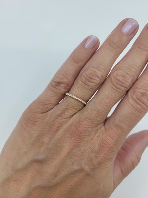 Lot 137 - A DIAMOND HALF ETERNITY RING, mounted in 18ct...