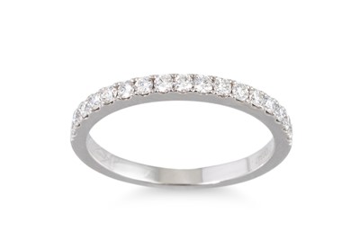 Lot 138 - A DIAMOND HALF ETERNITY RING, mounted in...