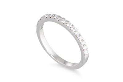 Lot 138 - A DIAMOND HALF ETERNITY RING, mounted in...