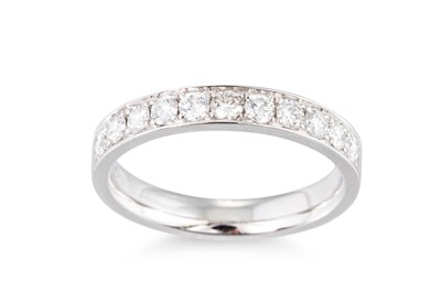 Lot 183 - A DIAMOND HALF ETERNITY RING, the brilliant...