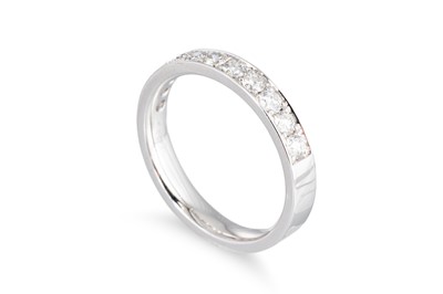 Lot 183 - A DIAMOND HALF ETERNITY RING, the brilliant...