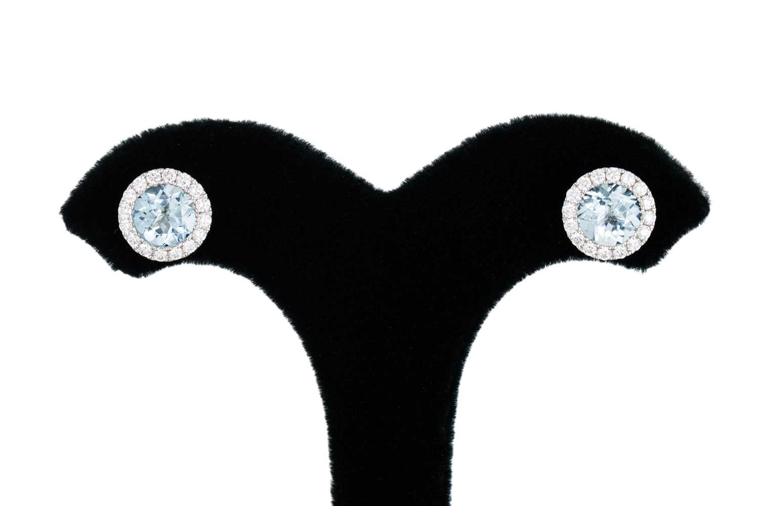 Lot 184 - A PAIR OF AQUAMARINE AND DIAMOND CLUSTER...