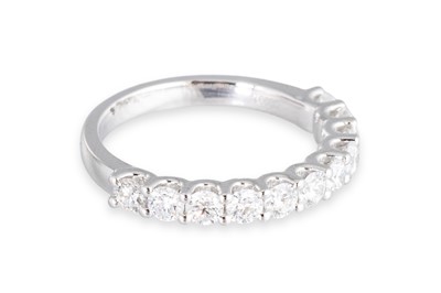 Lot 186 - A DIAMOND HALF ETERNITY RING, the brilliant...