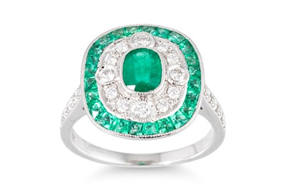 Lot 258 - AN EMERALD AND DIAMOND CLUSTER RING, the...