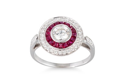 Lot 259 - A RUBY AND DIAMOND CLUSTER RING, of circular...