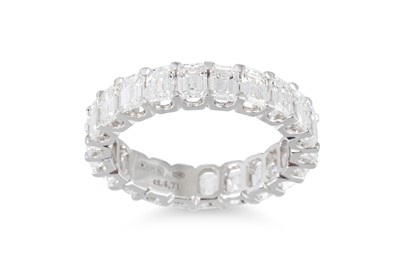 Lot 312 - AN EMERALD CUT DIAMOND FULL BANDED ETERNITY...