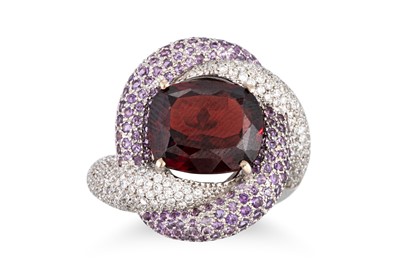 Lot 208 - A GARNET, DIAMOND AND AMETHYST CROSSOVER STYLE...
