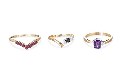Lot 2 - A GOLD CROSS-OVER RING, size J-K, together...