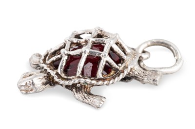 Lot 49 - A 9CT YELLOW GOLD CHARM BRACELET, set with...