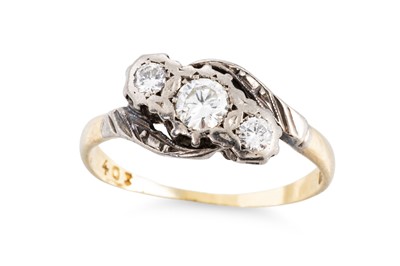 Lot 115 - A VINTAGE THREE STONE DIAMOND RING, of twist...