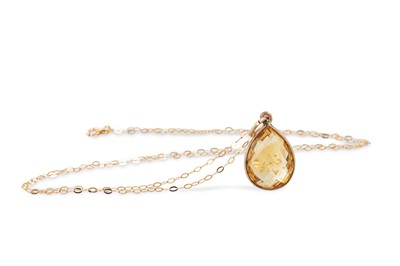 Lot 15 - A CITRINE PENDANT, the mixed pear cut citrine...