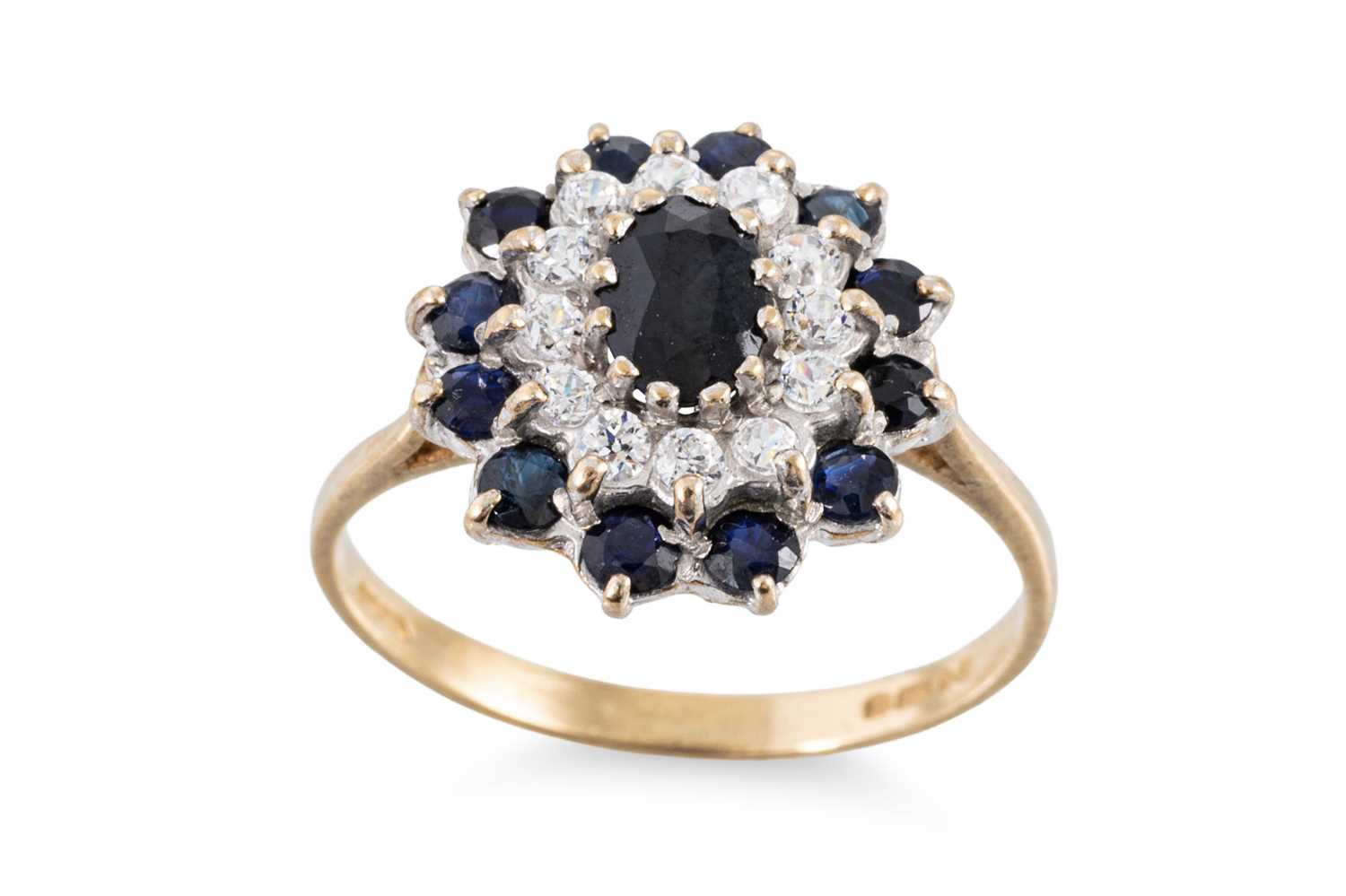 Lot 38 - A SAPPHIRE AND STONESET CLUSTER RING, mounted...