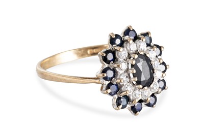 Lot 38 - A SAPPHIRE AND STONESET CLUSTER RING, mounted...