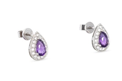 Lot 40 - A PAIR OF DIAMOND AND AMETHYST CLUSTER...