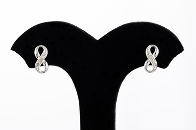 Lot 43 - A PAIR OF DIAMOND SET EARRINGS, in the form of...