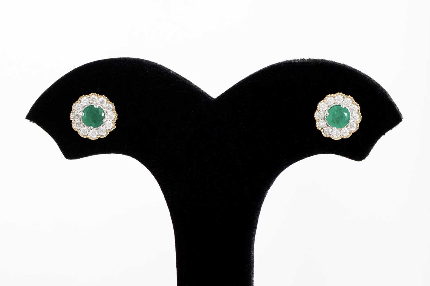 Lot 48 - A PAIR OF EMERALD AND DIAMOND TARGET STYLE...
