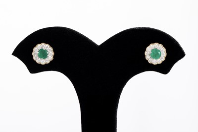 Lot 48 - A PAIR OF EMERALD AND DIAMOND TARGET STYLE...