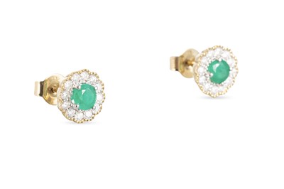 Lot 48 - A PAIR OF EMERALD AND DIAMOND TARGET STYLE...