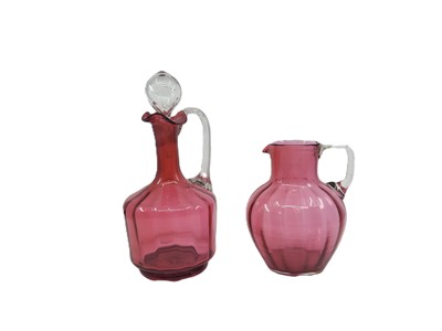Lot 586 - AN ANTIQUE CRANBERRY GLASS DECANTER, with...