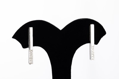 Lot 127 - A PAIR OF DIAMOND DROP EARRINGS, the diamond...