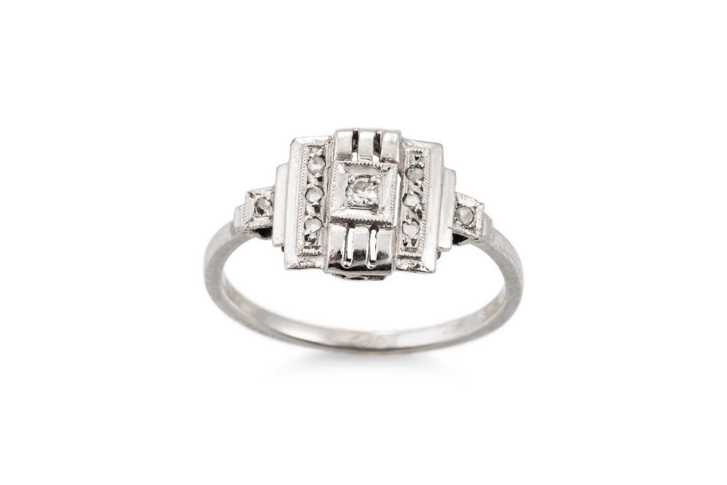 Lot 1 - A DIAMOND SET ART DECO RING, mounted in 18ct...