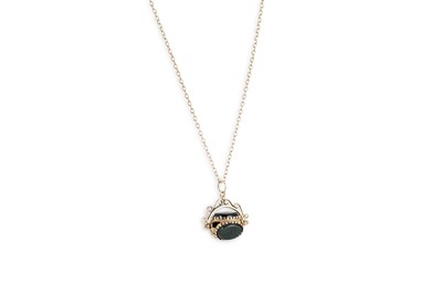 Lot 94 - A 9CT GOLD SWIVEL FOB PENDANT,  hardstone set,...