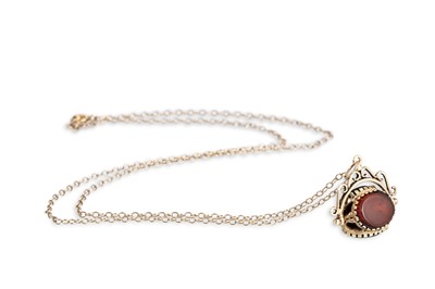 Lot 94 - A 9CT GOLD SWIVEL FOB PENDANT, hardstone set,...