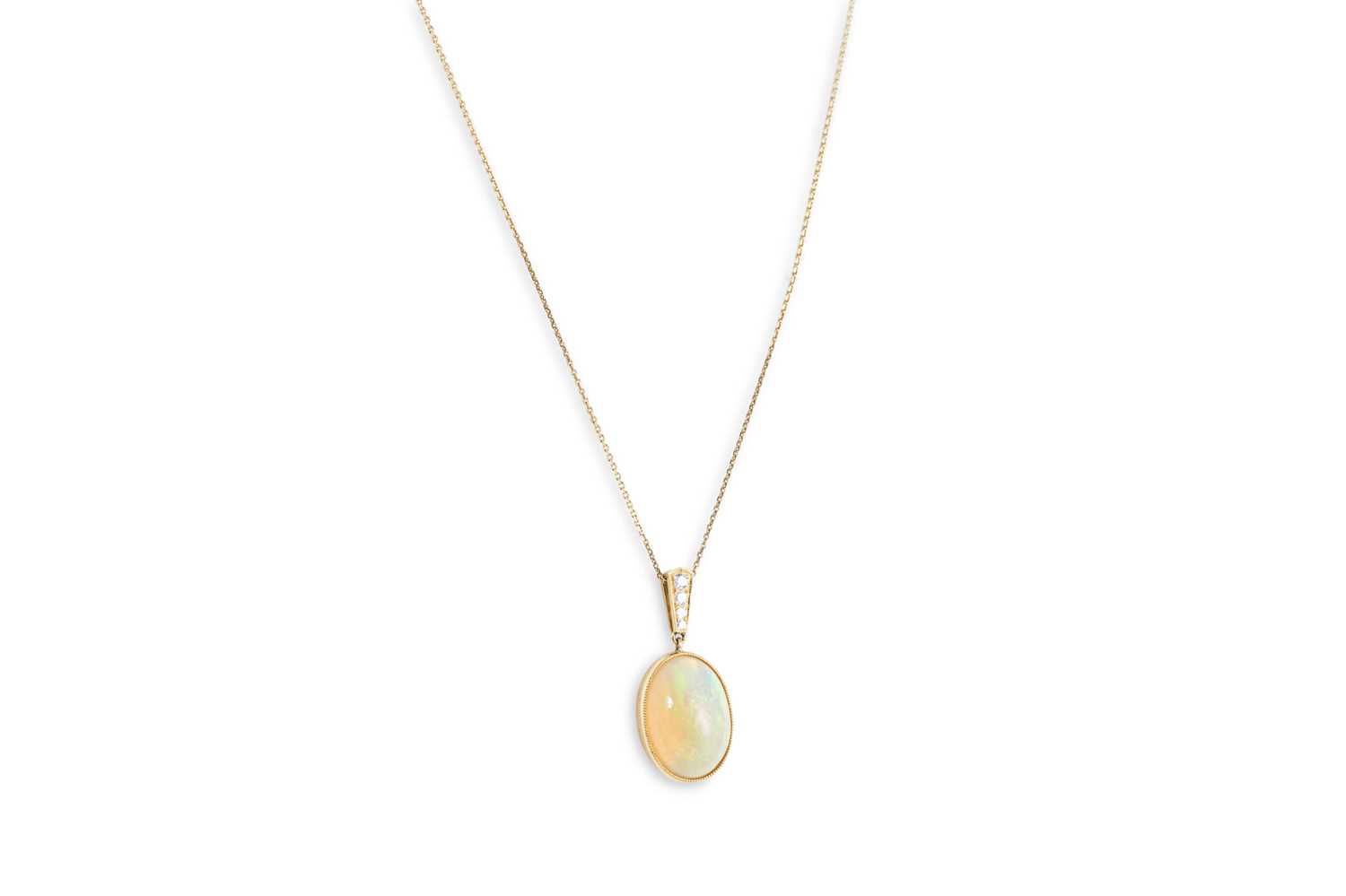 Lot 96 - AN OPAL AND DIAMOND PENDANT, mounted in 18ct...
