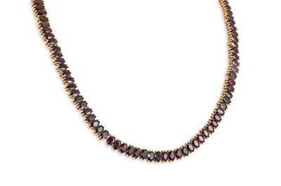 Lot 423 - A GARNET SET NECKLACE, mounted in unmarked...